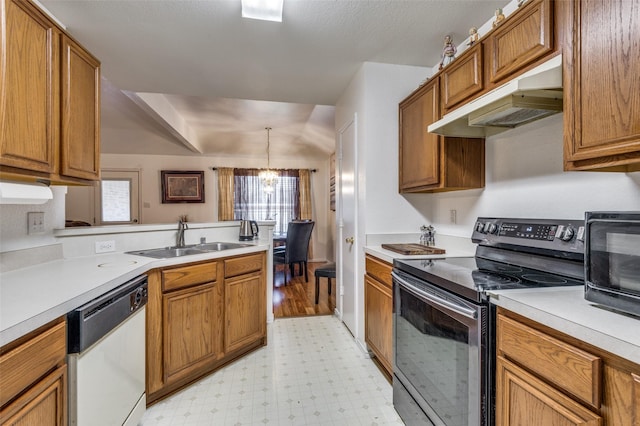 kitchen featuring sink, pendant lighting, a notable chandelier, dishwasher, and black range with electric stovetop