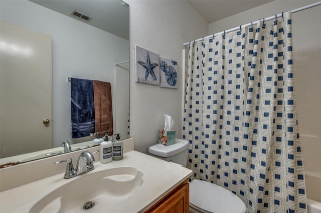 full bathroom with shower / bath combo, toilet, and vanity