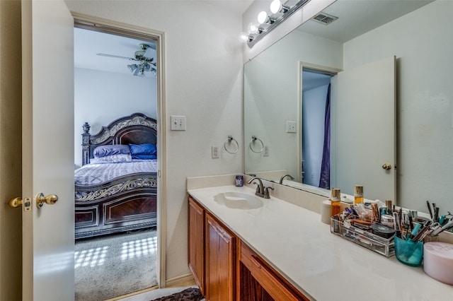 bathroom with vanity and ceiling fan