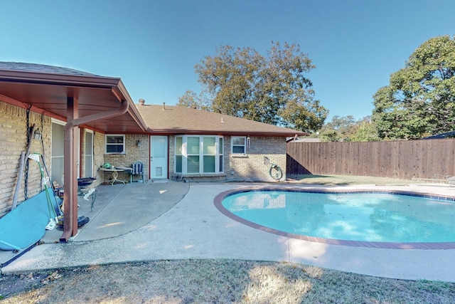 view of pool featuring a patio