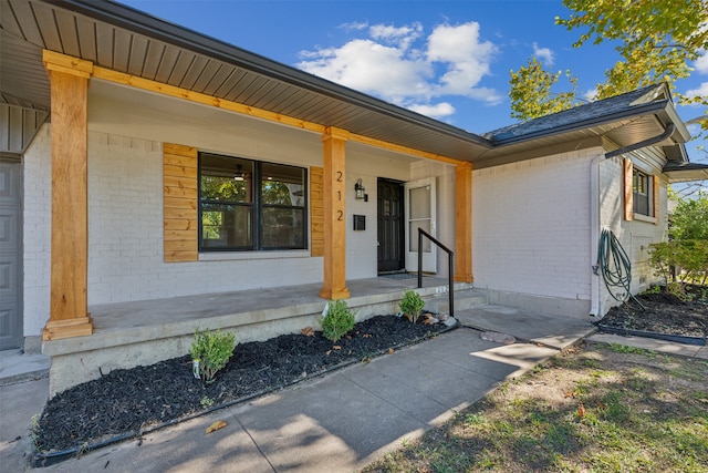 entrance to property with a porch