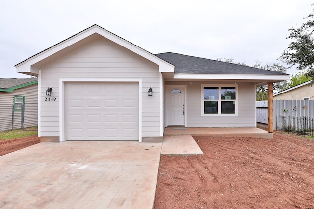 ranch-style house featuring a garage