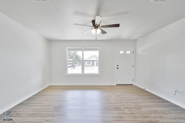 foyer featuring light hardwood / wood-style floors and ceiling fan