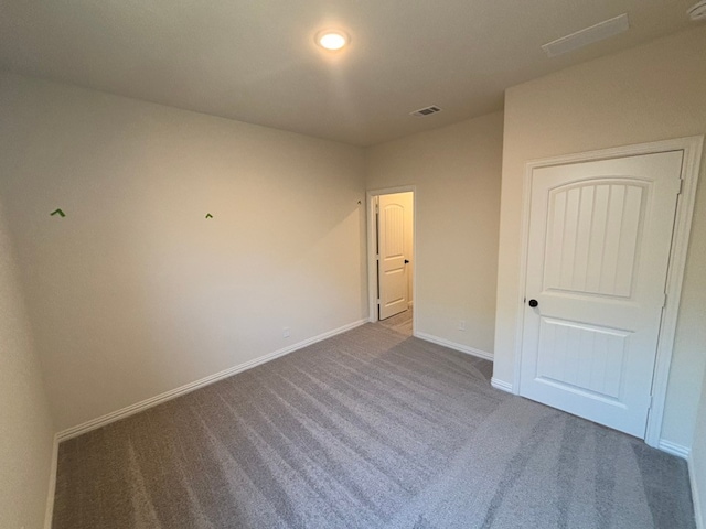 unfurnished bedroom with carpet flooring