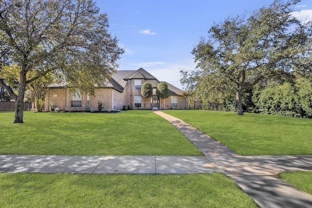 view of front of house with a front lawn