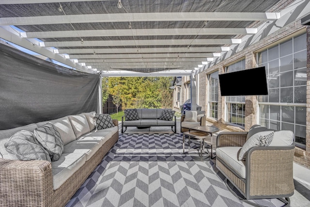 view of patio featuring outdoor lounge area and a pergola