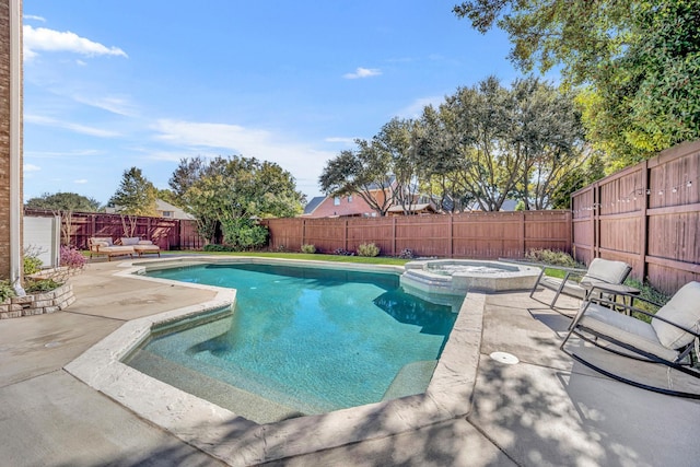 view of pool featuring an in ground hot tub and a patio area