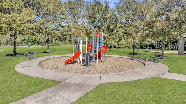 view of playground with a yard