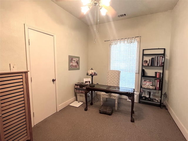 office with a ceiling fan, carpet, visible vents, and baseboards