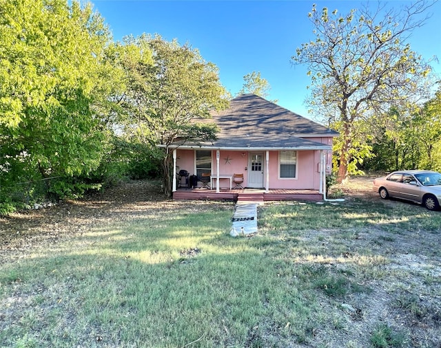 view of front facade with a porch and a front yard