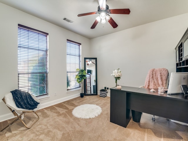 office featuring light colored carpet and ceiling fan