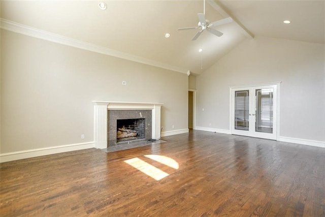 unfurnished living room with ornamental molding, ceiling fan, high vaulted ceiling, a premium fireplace, and dark hardwood / wood-style floors