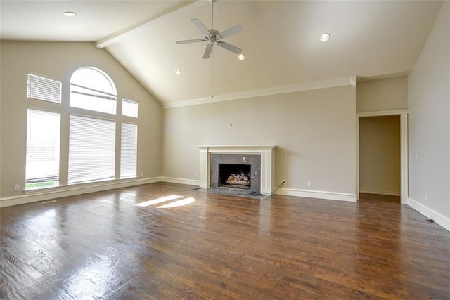 unfurnished living room with beamed ceiling, ceiling fan, dark hardwood / wood-style flooring, and high vaulted ceiling