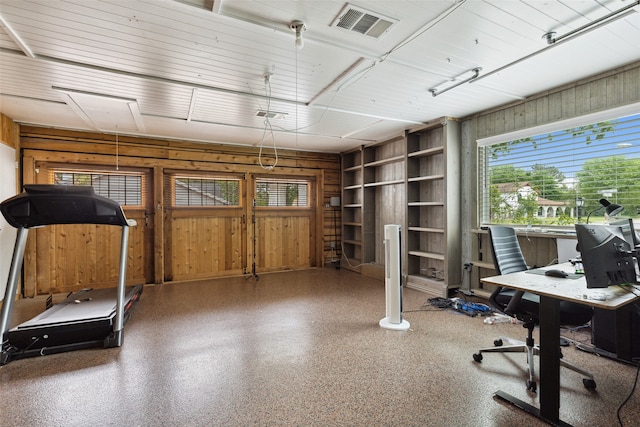 home office with wooden walls