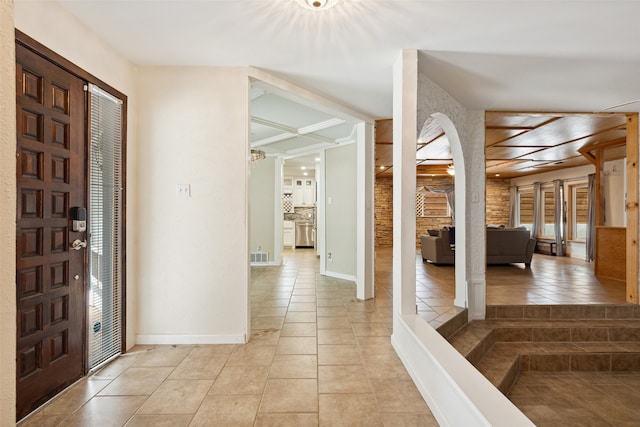 entryway featuring light tile patterned flooring