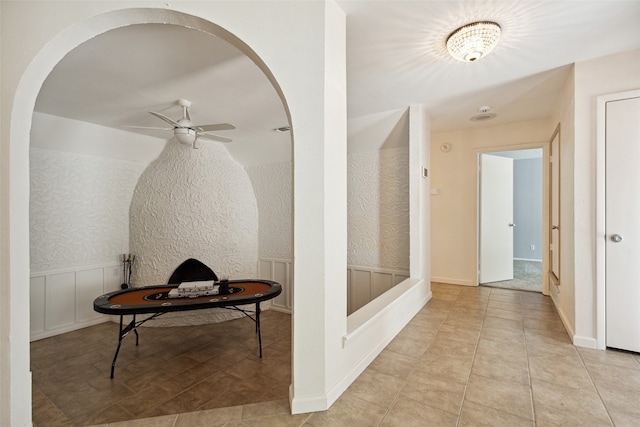 hallway with light tile patterned floors