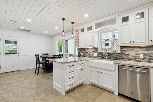 kitchen with white cabinetry, dishwasher, and light stone counters