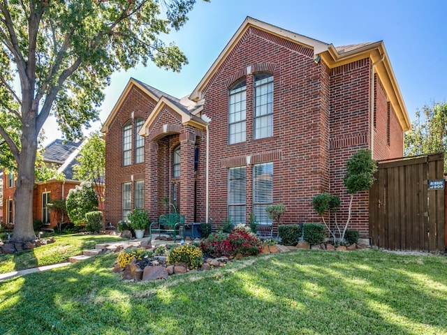 front facade featuring a front lawn