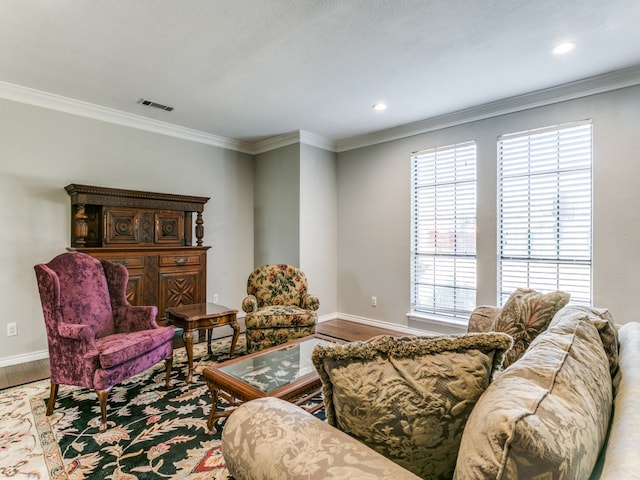 living room with ornamental molding and hardwood / wood-style floors