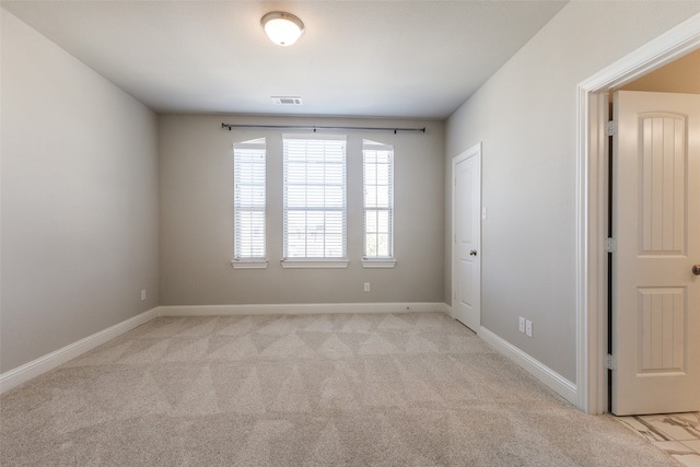 view of carpeted spare room