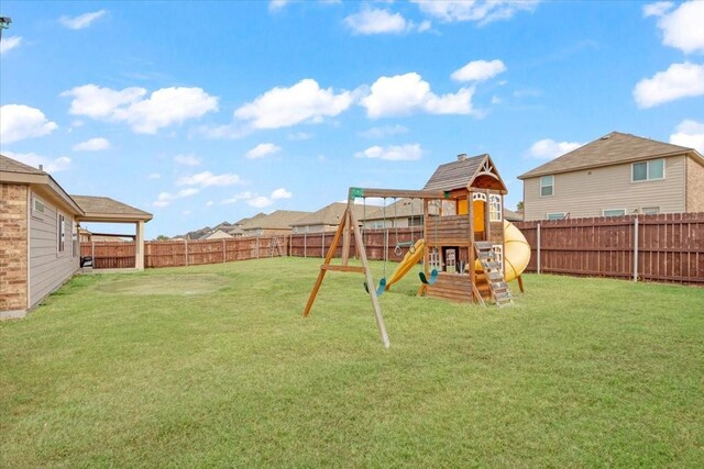 view of play area with a yard