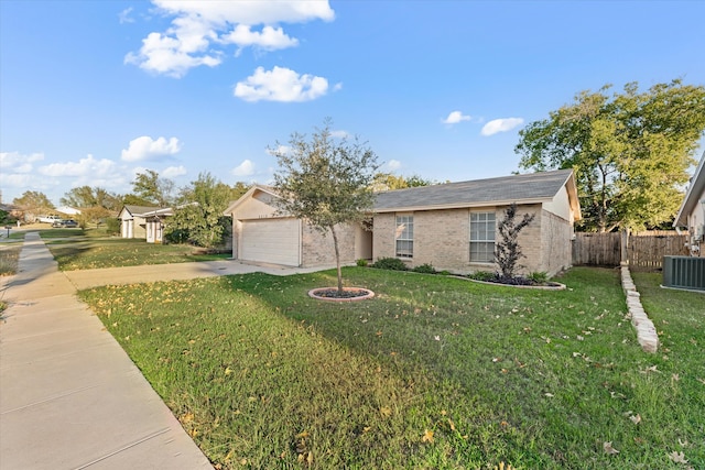 ranch-style house featuring cooling unit, a front lawn, and a garage