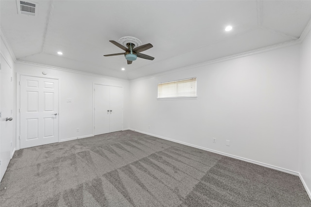 spare room with carpet flooring, ceiling fan, and ornamental molding