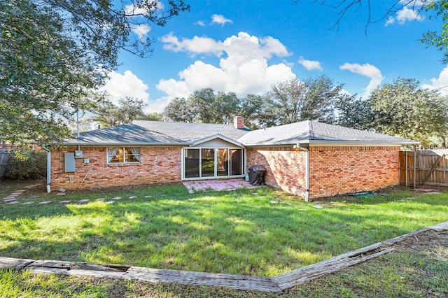 7101 Ellis Rd, Fort Worth, TX 76112 - back of house with brick siding and a chimney
