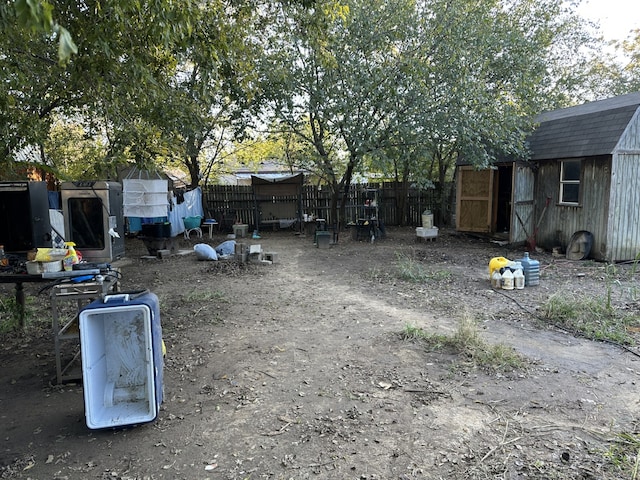 view of yard with a storage shed