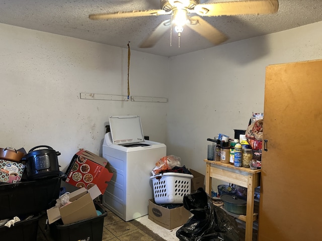 laundry room featuring a textured ceiling, washer / clothes dryer, and ceiling fan