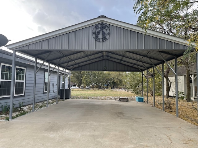 view of vehicle parking with a carport