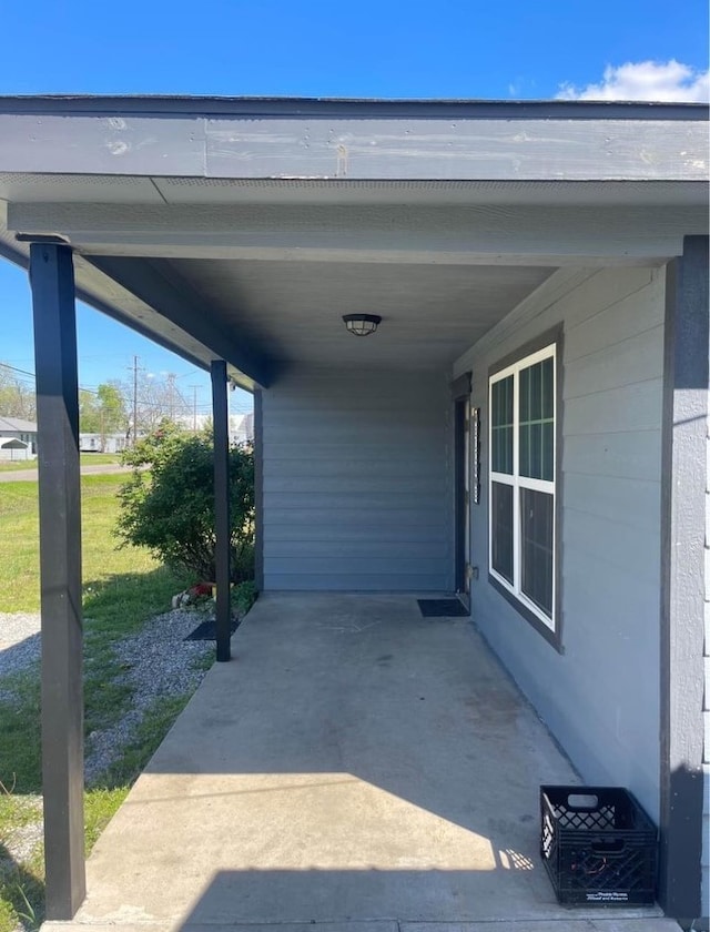 view of car parking featuring a carport