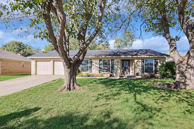 single story home with a front lawn and a garage