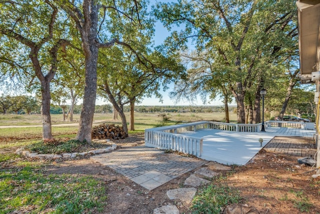 view of swimming pool with a deck