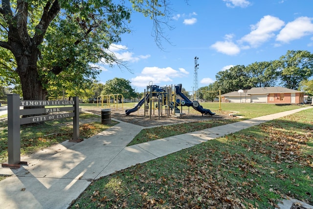 view of playground with a yard