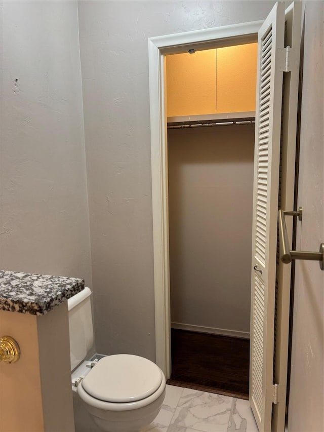 bathroom featuring toilet