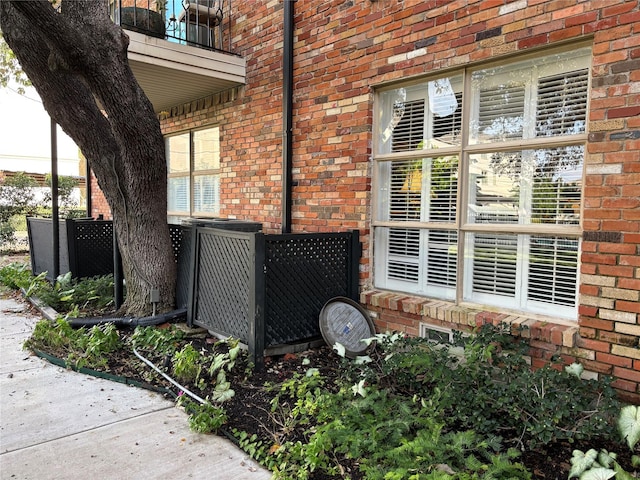 view of side of property featuring a balcony