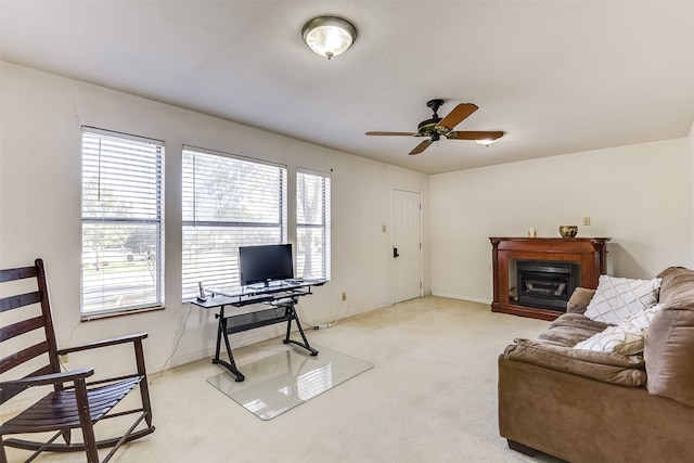 office space with carpet and ceiling fan