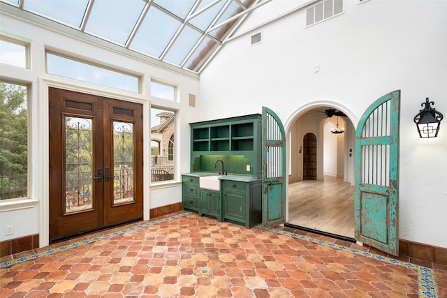 entrance to property featuring french doors and sink