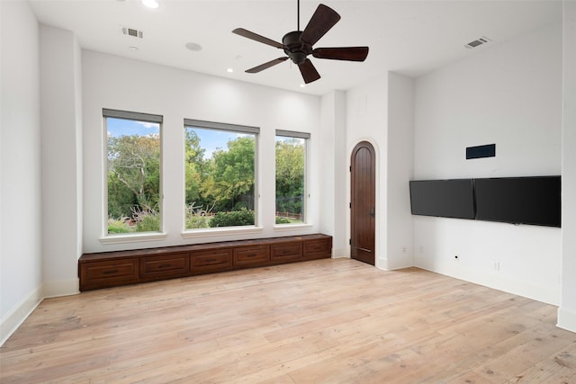 unfurnished room featuring light wood-style floors, visible vents, and recessed lighting