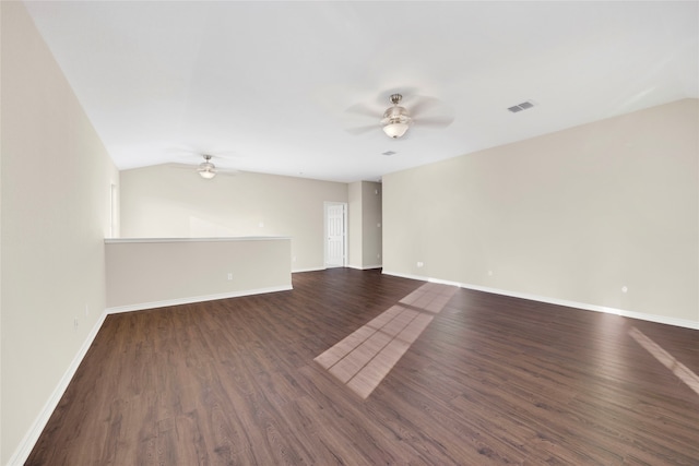 spare room with ceiling fan, lofted ceiling, and dark hardwood / wood-style flooring