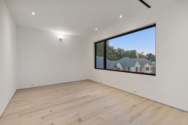 empty room with light wood-type flooring