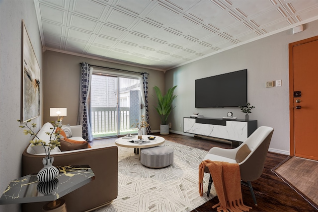 living room featuring hardwood / wood-style flooring and crown molding