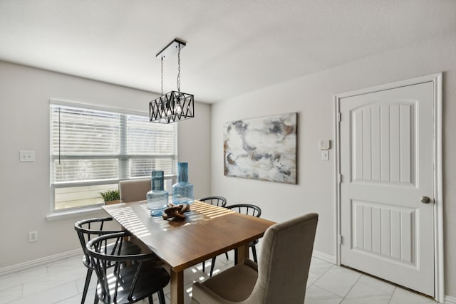 dining room with a chandelier