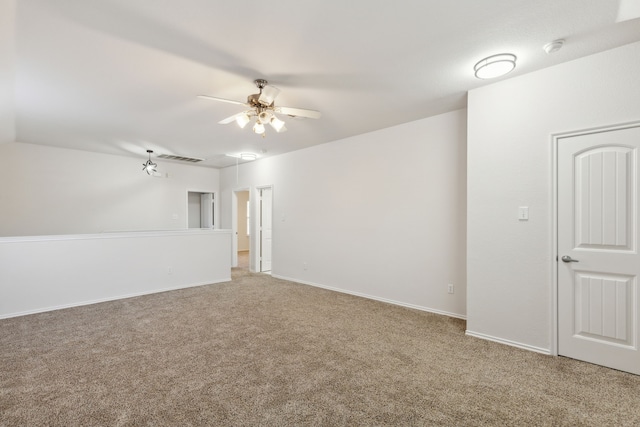 unfurnished room featuring carpet and ceiling fan