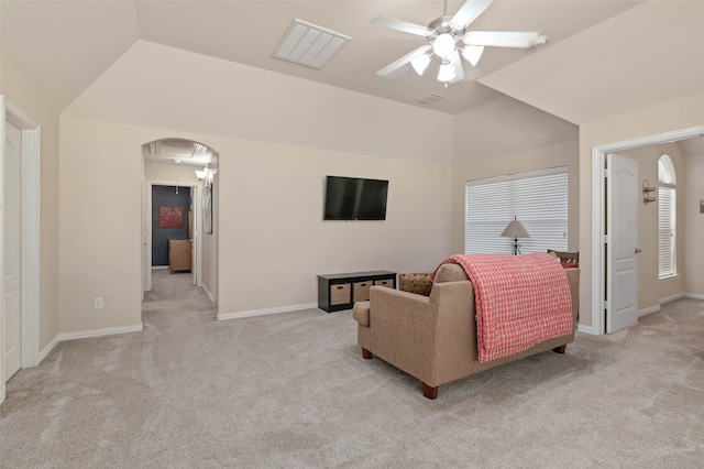 living room with light carpet, vaulted ceiling, and ceiling fan