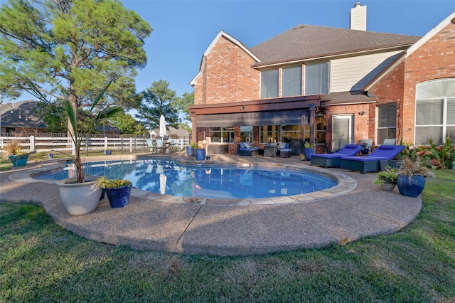 view of swimming pool featuring an outdoor living space and a patio area