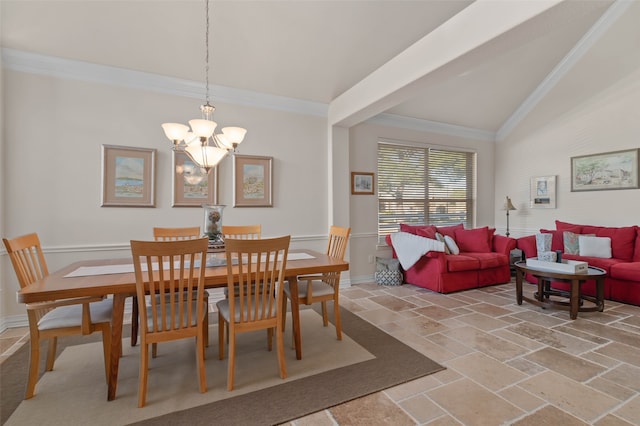 dining space with a chandelier, crown molding, and vaulted ceiling