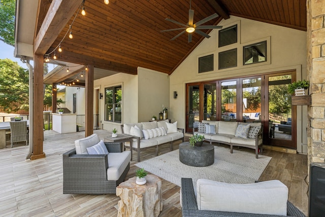 view of patio / terrace featuring french doors, an outdoor living space, and ceiling fan