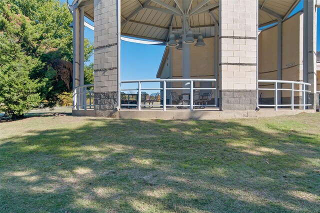 view of side of property featuring a lawn